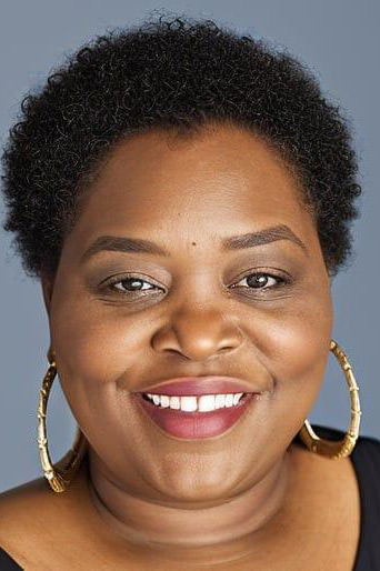 a brown lady smiling