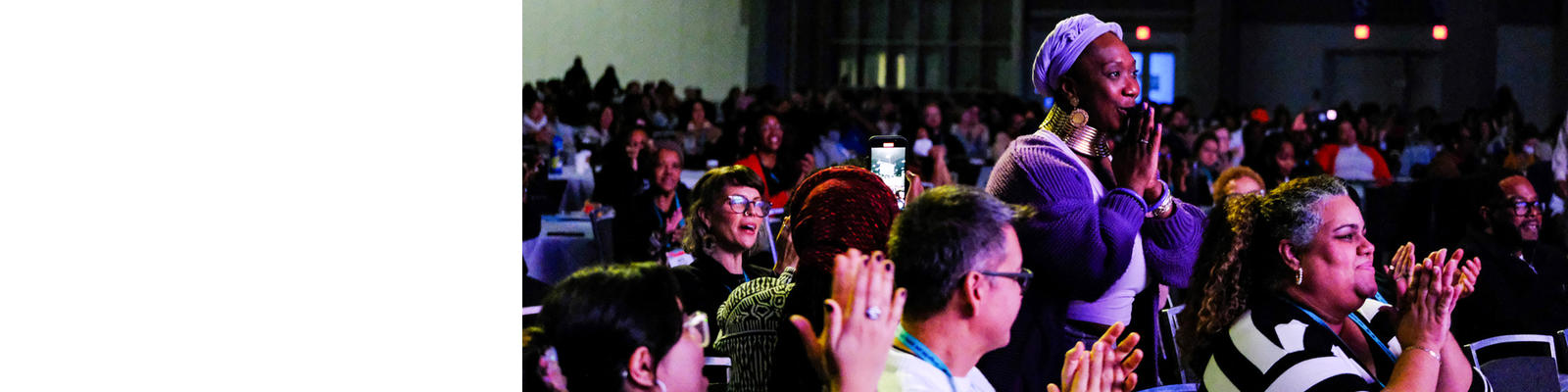 People applauding from audience.