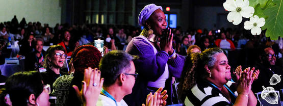 People applauding from audience.