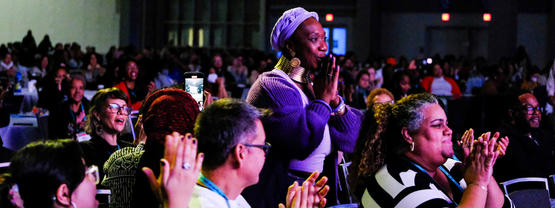 People applauding from audience.