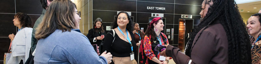 Group of people talking happily.